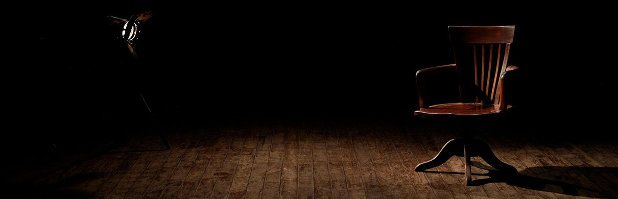 lonely chair with spotlight
